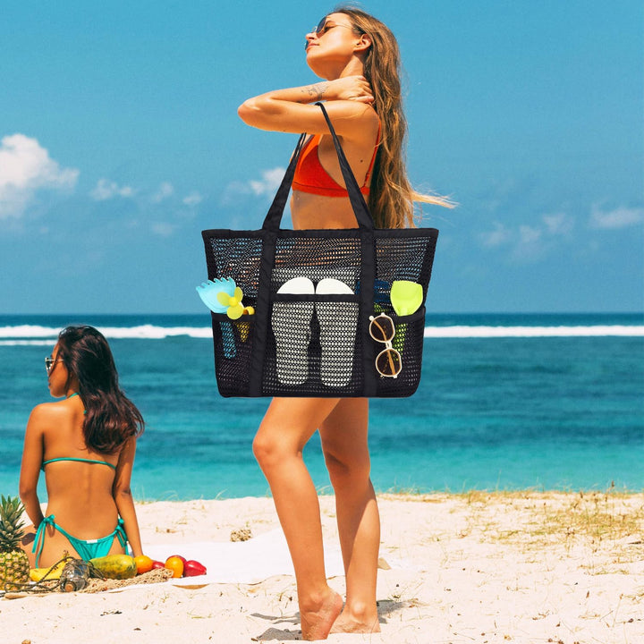 Clear mesh beach tote with secure zipper closure for main compartment