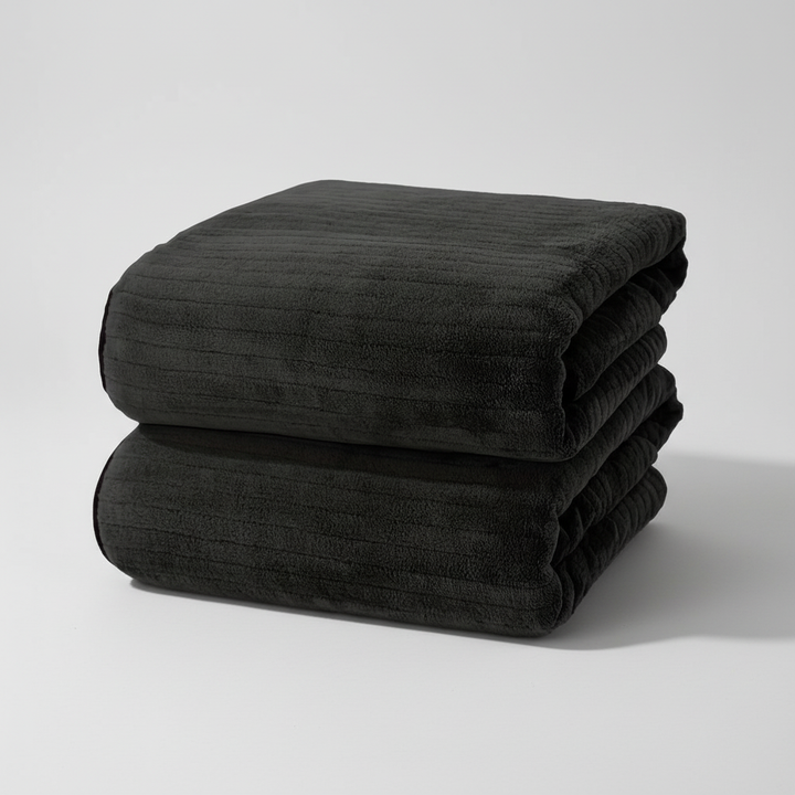 Extra large microfiber bath towel set in a vibrant teal, emphasizing its absorbent and practical use as bathroom essentials.