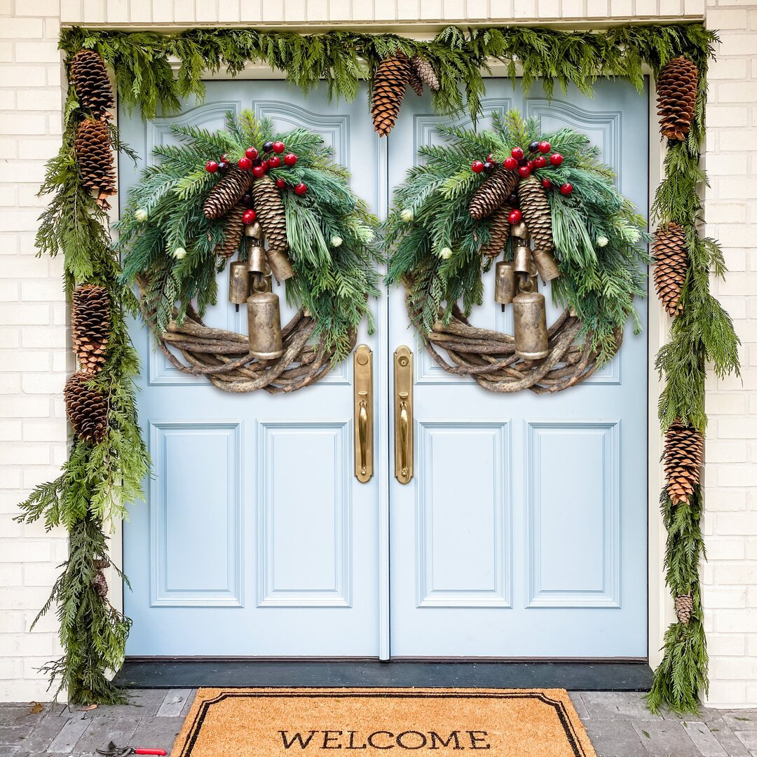 Unique farmhouse boho Christmas wreath, handcrafted with natural elements for festive seasonal decor.