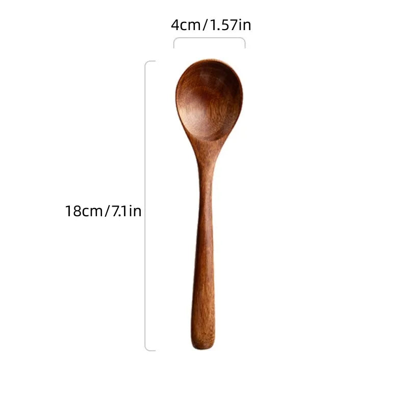 Eco-friendly wooden serving utensils, ideal for family meals. A natural addition to your farmhouse kitchen.