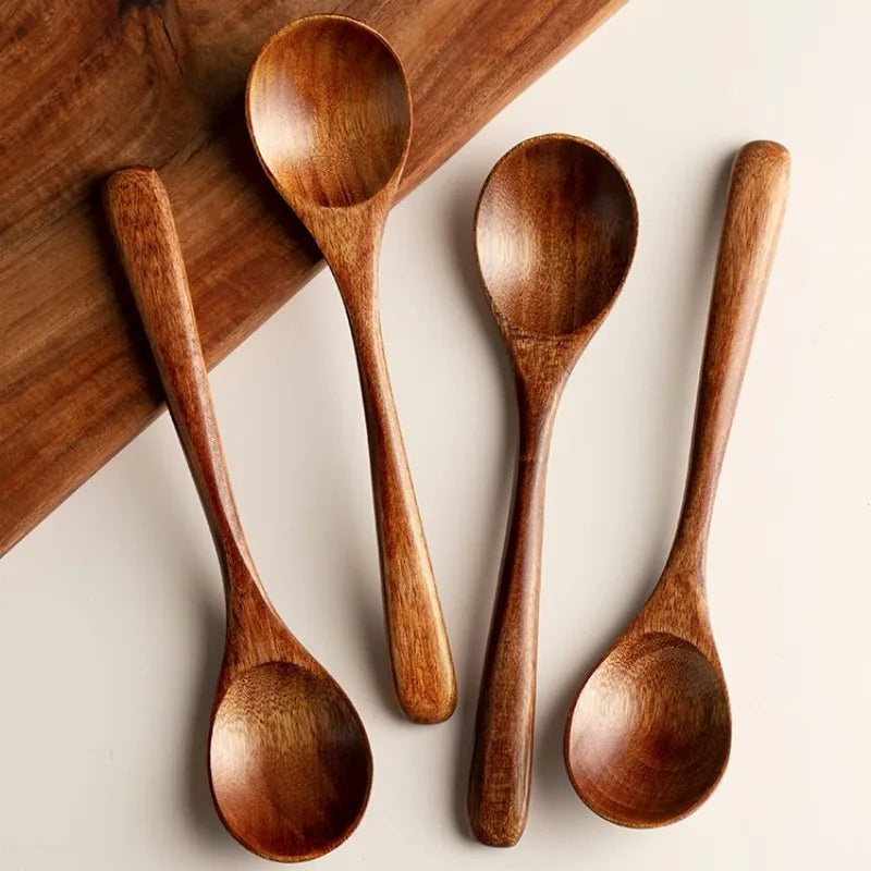 High-quality, eco-friendly wooden cooking spoons and serving utensils. Essential farmhouse kitchen tools.