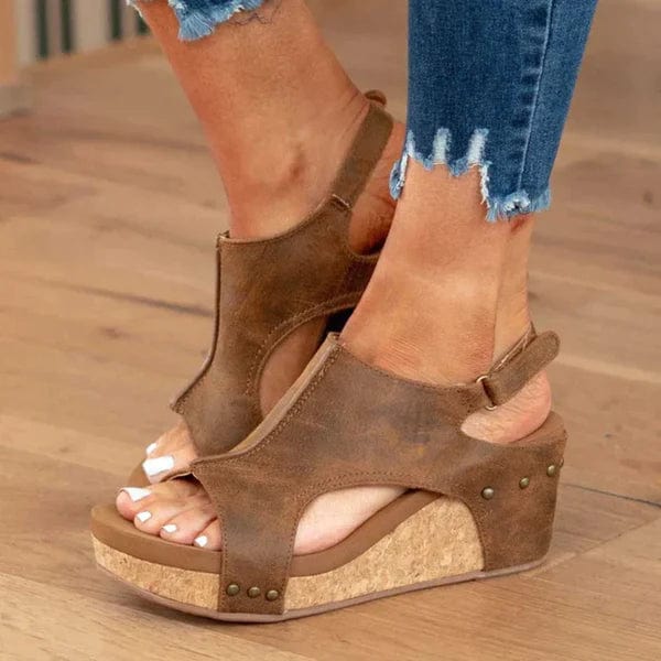 Elegant slip-on women's wedge sandals with orthopaedic foot support for all-day comfort.