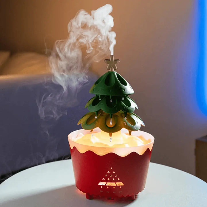 Festive Christmas tree aroma diffuser with essential oil mist, perfect for holiday home decor and ambiance.