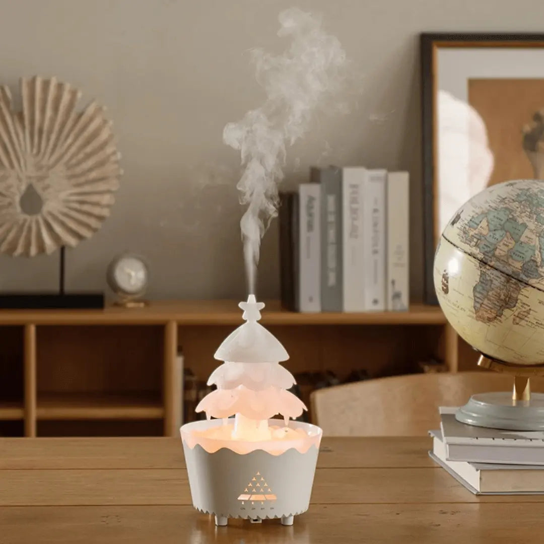 Elegant Christmas tree essential oil diffuser, ideal for silent aromatherapy and creating a festive holiday atmosphere.