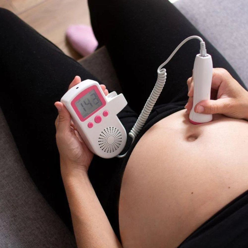 Fetal heart rate monitor for expecting mothers to check baby's well-being at home. Safe prenatal doppler device.