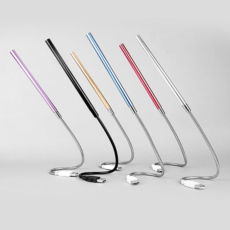 Compact USB LED gooseneck light, perfect for illuminating a keyboard or work area
