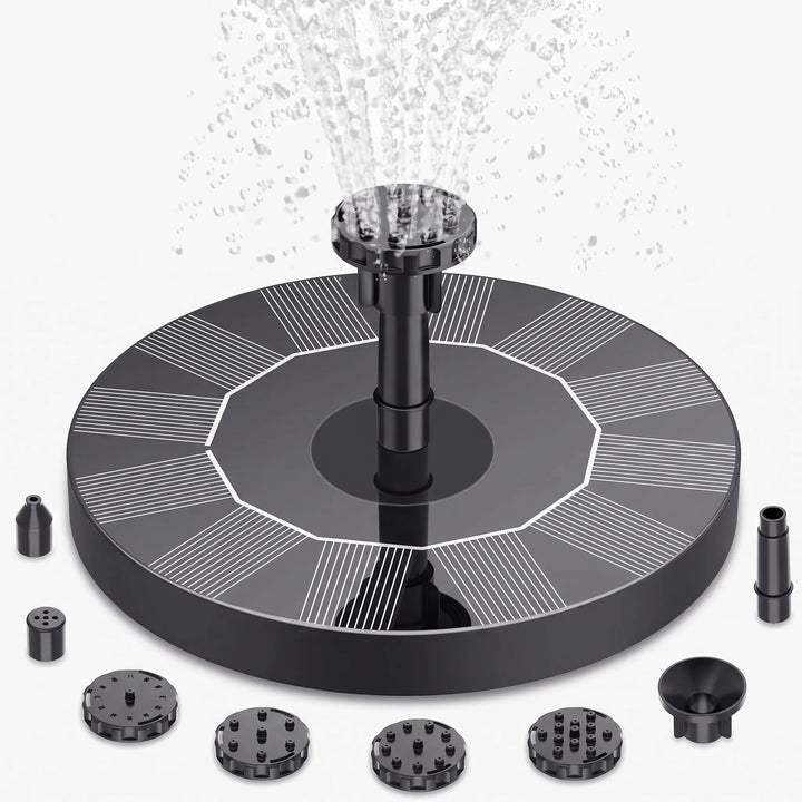 Solar-powered floating fountain enhancing a bird bath. Perfect garden decor & water feature for wildlife.