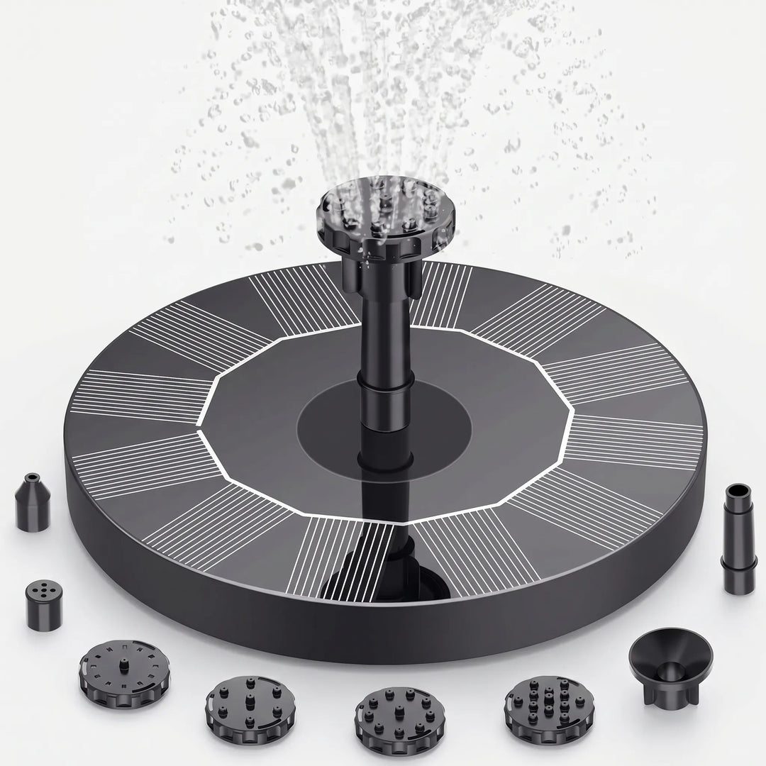 Decorative floating solar fountain spouting water, adding beauty to any garden, pond, or bird bath.