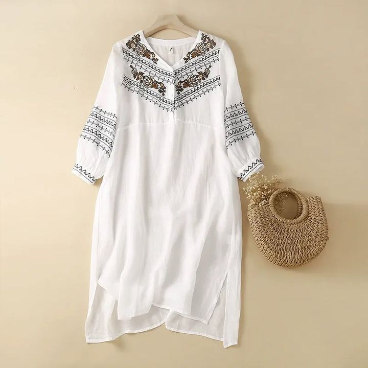 Flowy bohemian women's summer dress, perfect for casual wear, vacation, or warm weather outings. Lightweight & chic.