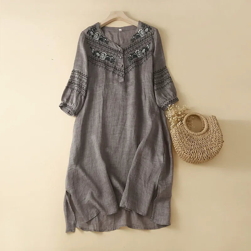 Relaxed fit short-sleeve women's bohemian summer dress. Flowy design for comfort & elegant warm-weather style.