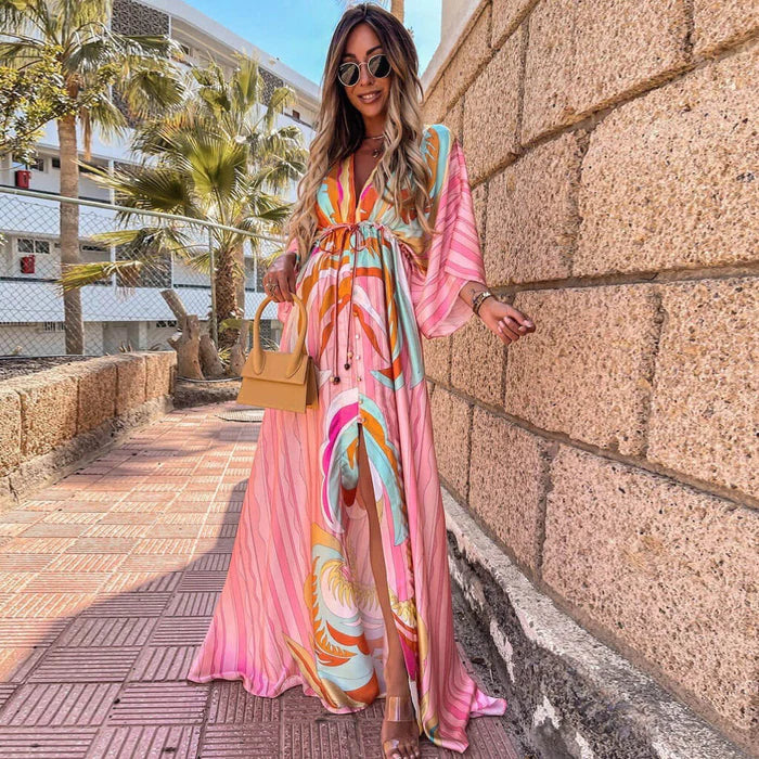 Flowy women's printed beach dress, perfect for summer vacations & resort wear. Lightweight & comfortable style.