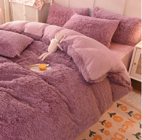 Bedroom featuring a soft fluffy candy-colored duvet cover, velvet winter bedding.