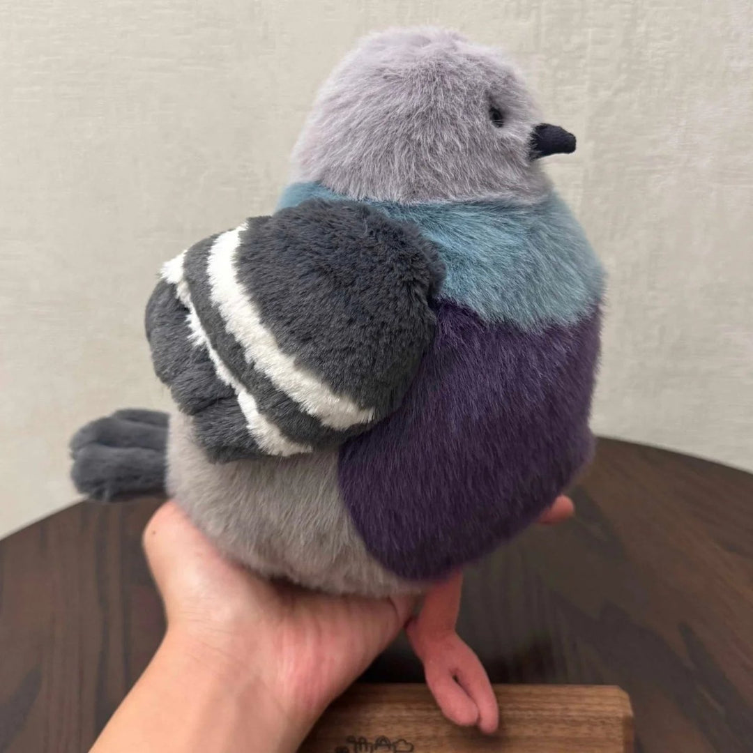 Unisex stuffed animal: a cozy, fluffy pigeon plush, perfect as a gift.
