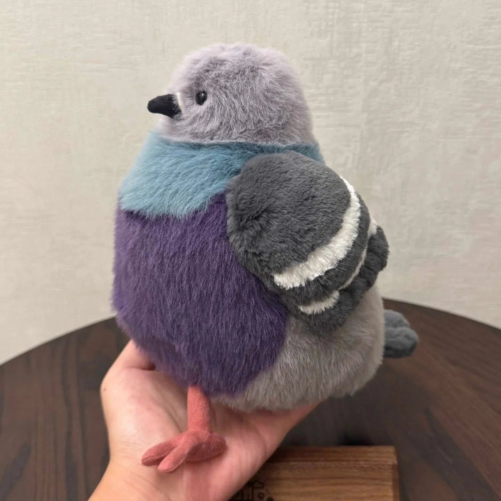 Cute pigeon soft toy, a comforting fluffy plush for snuggles & play.