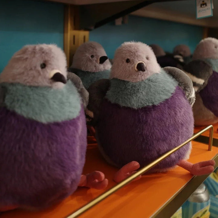 Fluffy pigeon comfort toy, a soft stuffed animal for all ages.