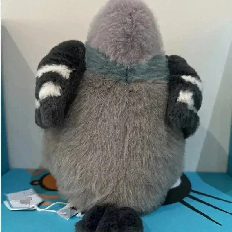 Comforting animal plush: fluffy pigeon, perfect for children's snuggles.