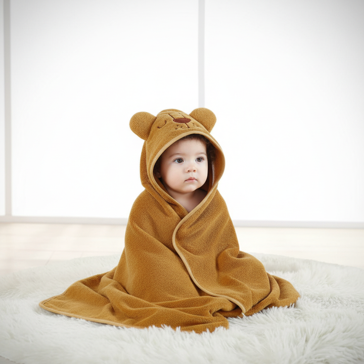 Folded FluffyTowel hooded baby towel, premium soft flannel for infant bath and nursery essentials