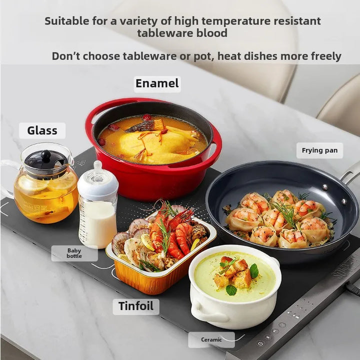 Compact 220V electric warmer with a foldable heating plate, heating a mug on a table.