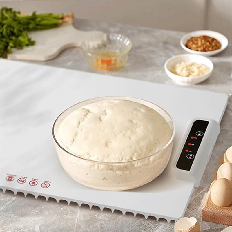 Versatile foldable electric food warmer mat, essential for kitchen use, keeping family meals at the perfect temperature.