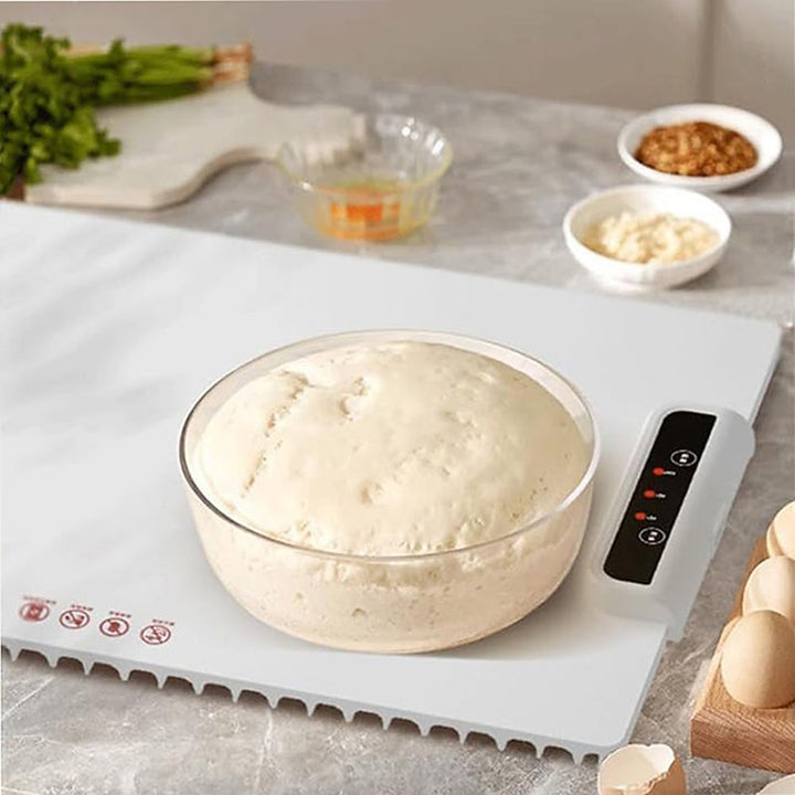 Versatile foldable electric food warmer mat, essential for kitchen use, keeping family meals at the perfect temperature.
