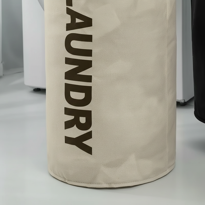 Water-repellent extra large laundry basket, collapsible for space-saving storage in dorm rooms.