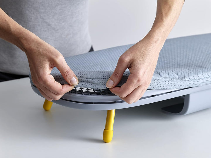 Close-up of DripLock Technology on a space-saving foldable ironing board for stain-free clothes