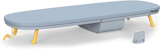 PressEase foldable ironing board, a compact laundry solution with DripLock for moisture control