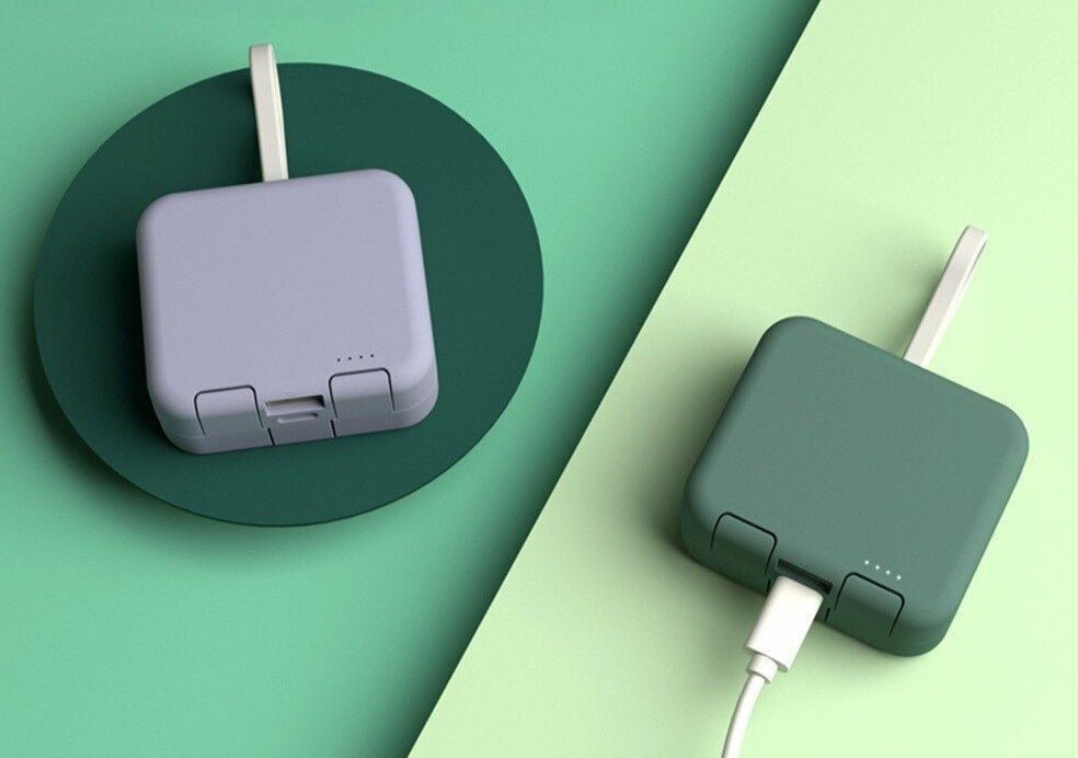 Portable power bank with foldable design, ideal for charging multiple devices. USB charger for phones & tablets.