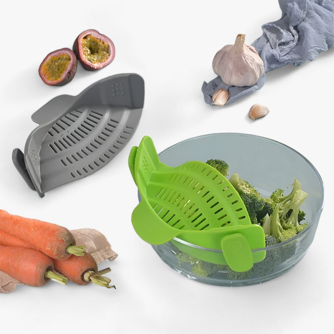 Collapsible silicone strainer for easy draining of fruits & vegetables. Dishwasher-safe food prep essential.