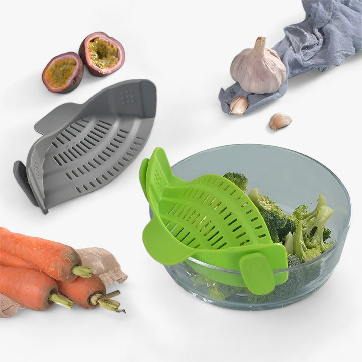 Collapsible silicone strainer for easy draining of fruits & vegetables. Dishwasher-safe food prep essential.