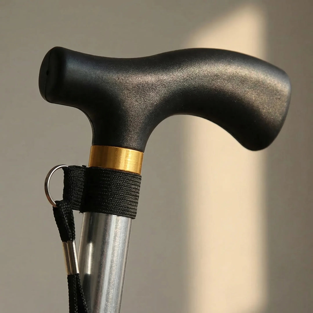 Travel-friendly folding cane, height-adjustable, offering compact & portable support for active seniors.