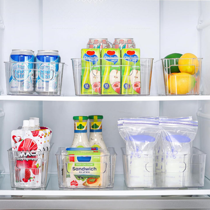 Reusable clear bins for food storage, keeping produce fresh and organized.
