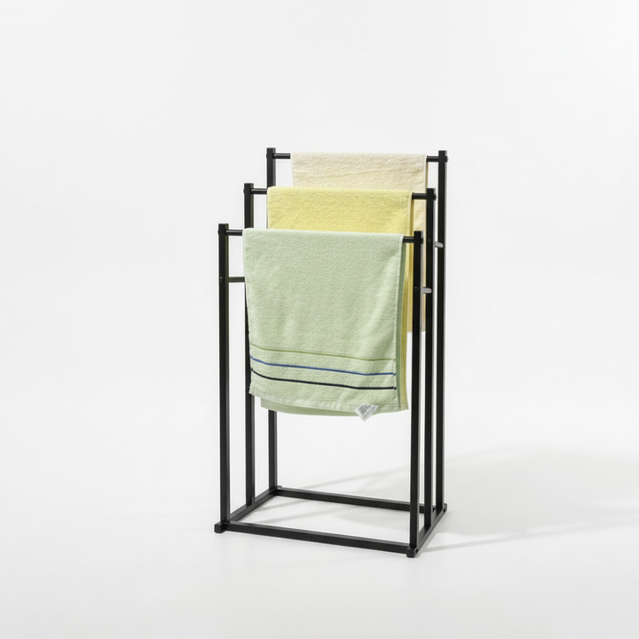 Stylish freestanding towel rack in black steel, ideal for modern home decor and bathroom organization