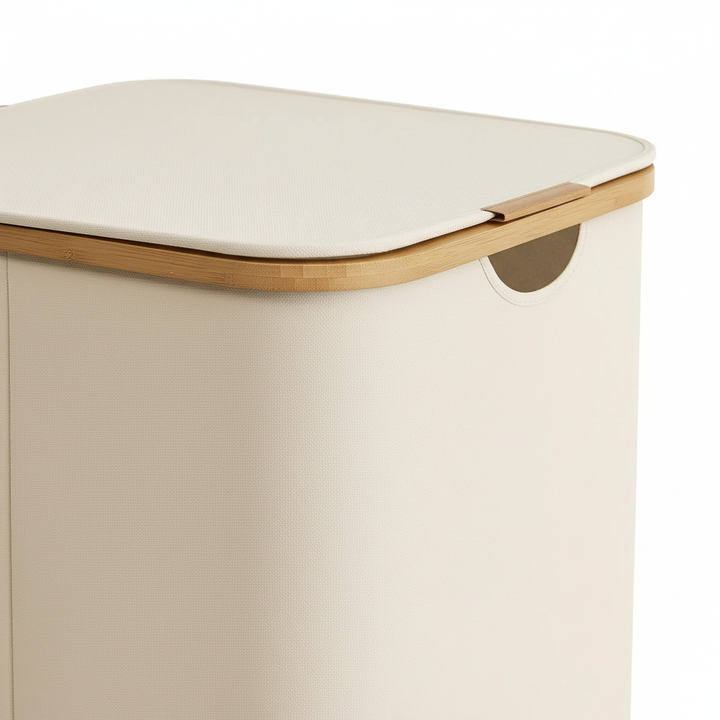 Breathable textile laundry basket with three sections, ideal for sorting darks, lights, and colors