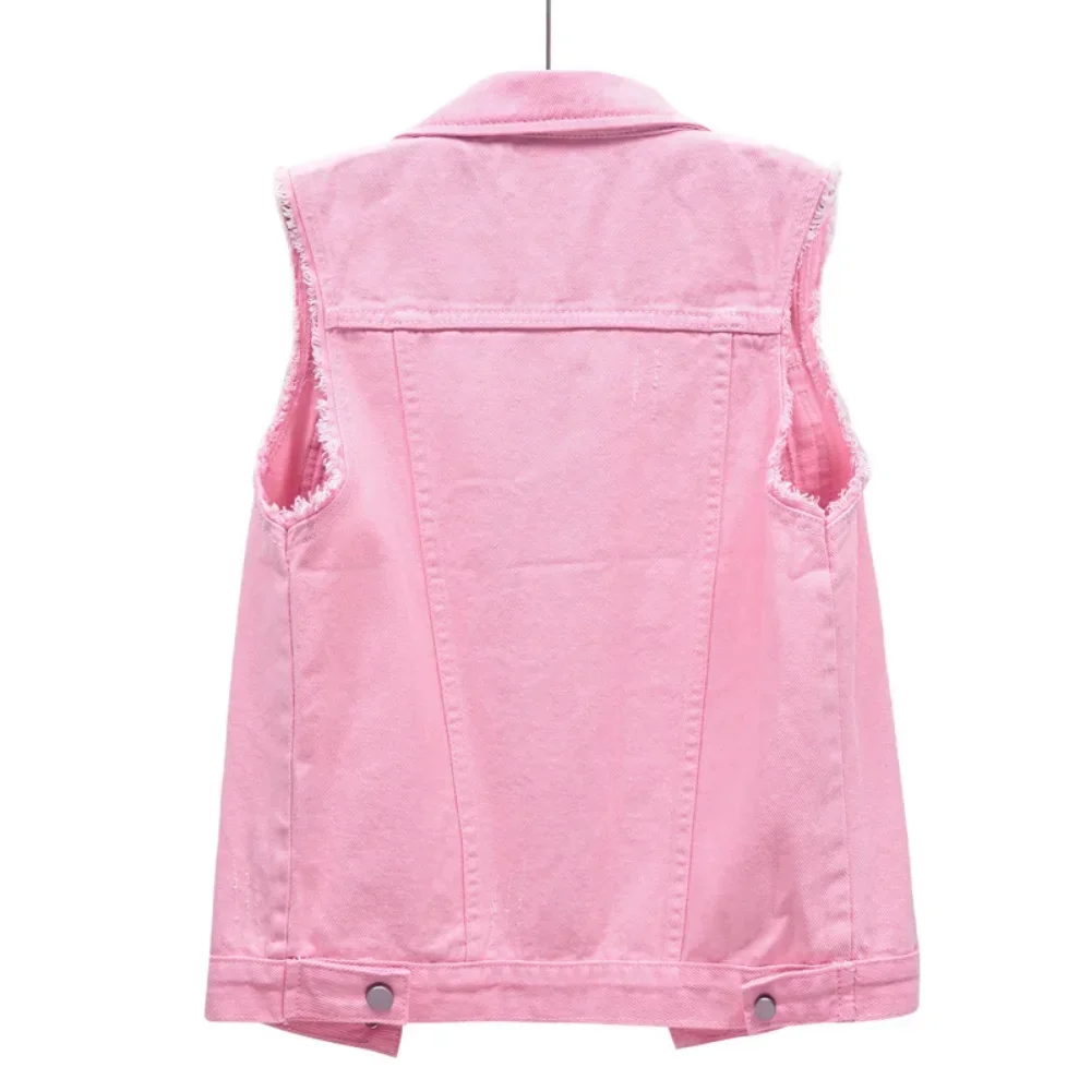 Women's sleeveless denim jacket with trendy raw edges, a casual fashion statement piece.