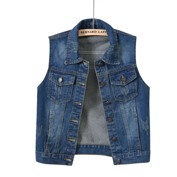 Close-up of the raw edge detail on a fashionable women's denim vest.