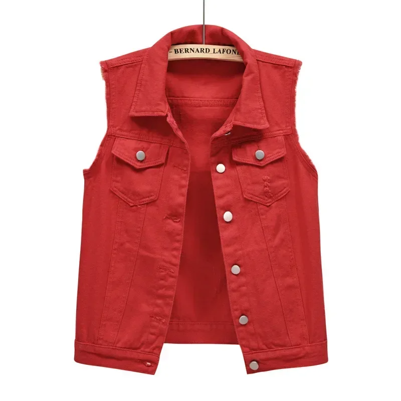 Women's denim vest with raw hem, a versatile and colorful layering piece for any casual look.