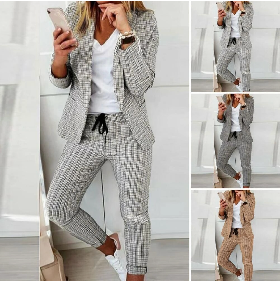Full-length image of a woman in an elegant Celeste luxury business suit, perfect for professional attire.