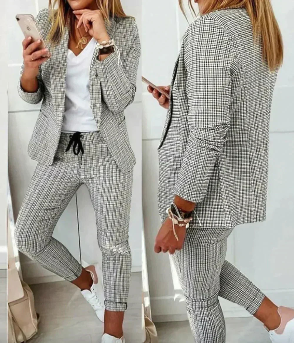 Close-up of a tailored Celeste women's luxury suit blazer, showcasing sophisticated style & quality fabric.
