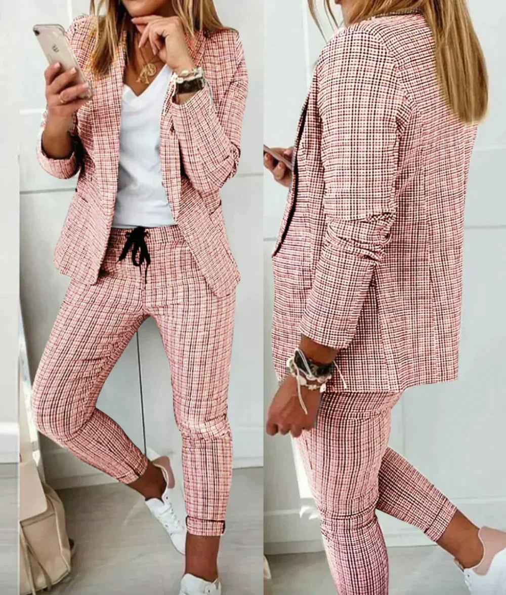 Model wearing a perfectly fitted Celeste women's luxury tailored suit, exuding professional elegance.