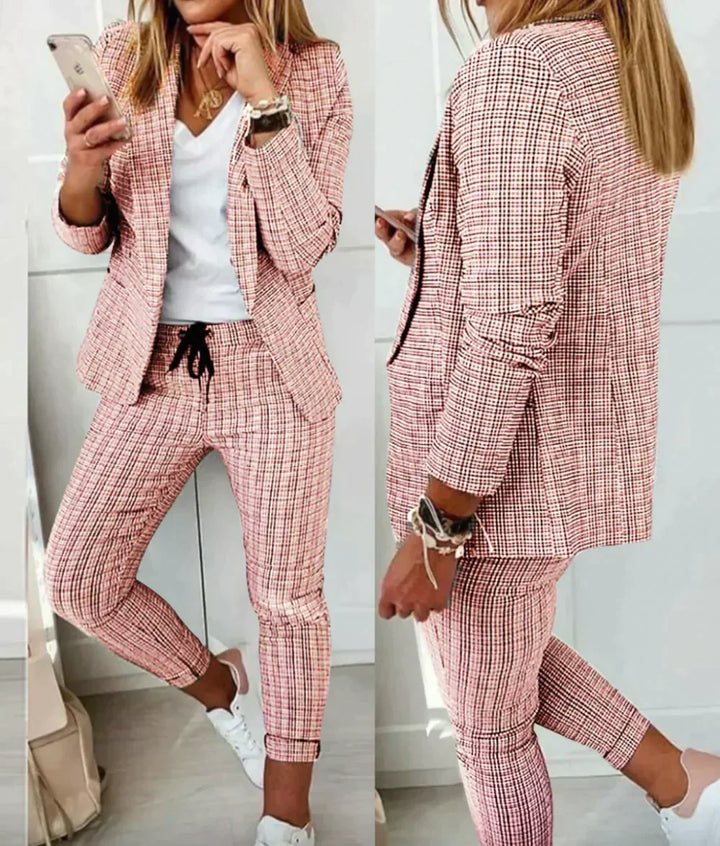 Model wearing a perfectly fitted Celeste women's luxury tailored suit, exuding professional elegance.