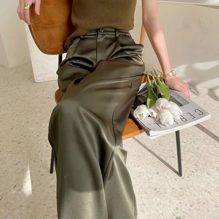 Chic women's high-waist wide-leg pants with a full-length, loose, and flowy silhouette.