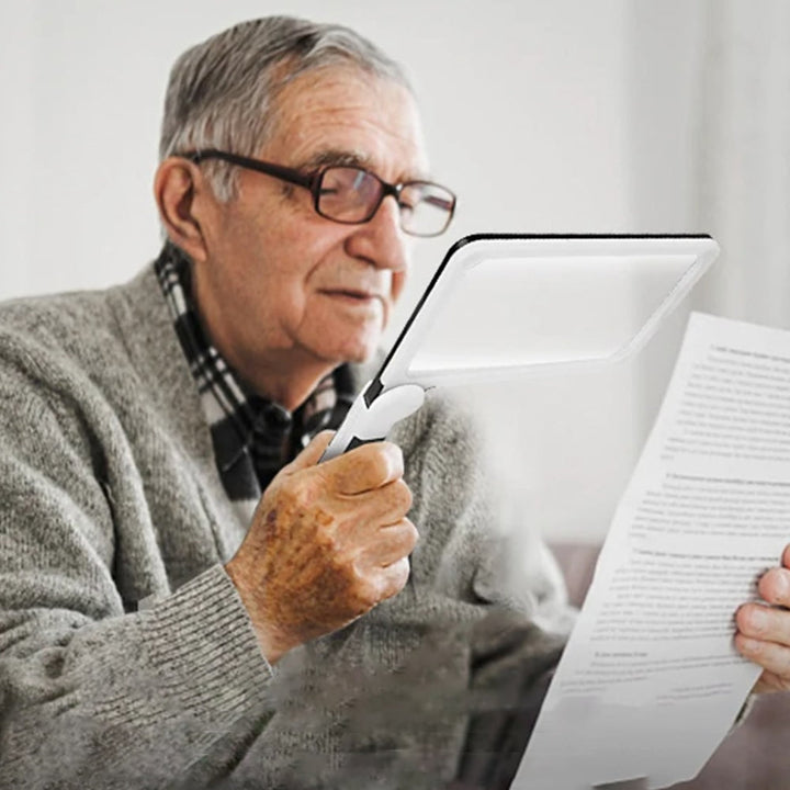 Full page handheld magnifying glass for reading books, documents, and hobbies. Ideal for low vision & seniors.