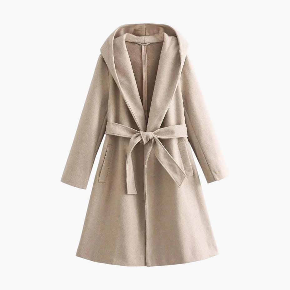 Front view of women's belted trenchcoat, fully closed. Sleek casual jacket for outdoor fashion.