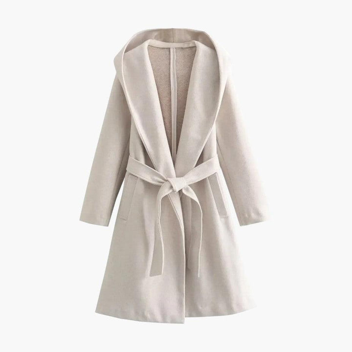 Women's hooded trenchcoat with the hood up, providing ultimate protection. Casual outdoor raincoat.
