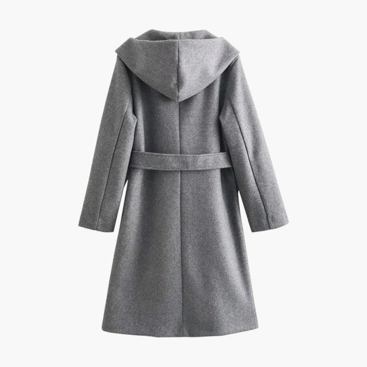 Back view of a women's belted trenchcoat with hood. Fashionable casual raincoat for women.