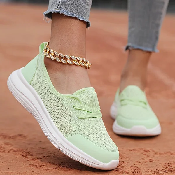 Front view of women's comfort shoes, featuring a lightweight, breathable design and orthopedic arch support.