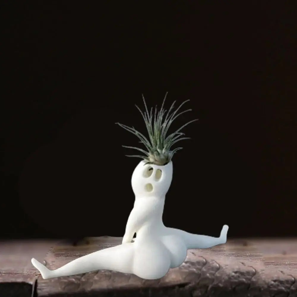 Spooky ghost resin plant holder, a unique decorative display for air plants. Perfect novelty home decor gift.