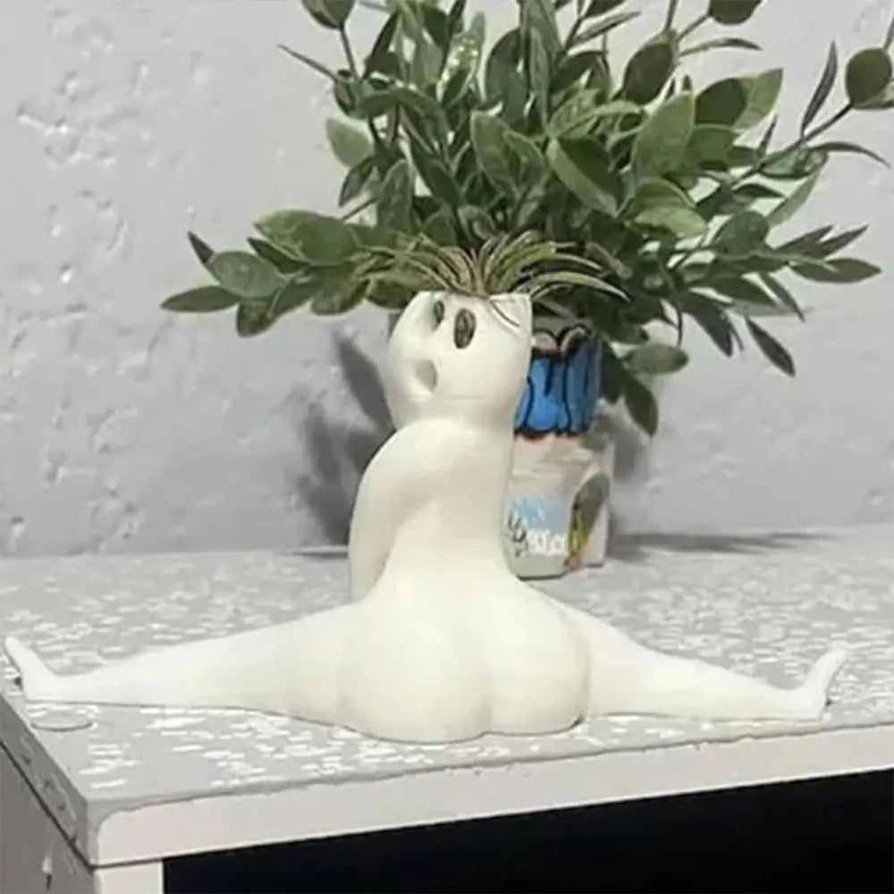 Unique ghost planter for air plants, handcrafted resin spooky decor. Ideal for indoor plant display & gifts.