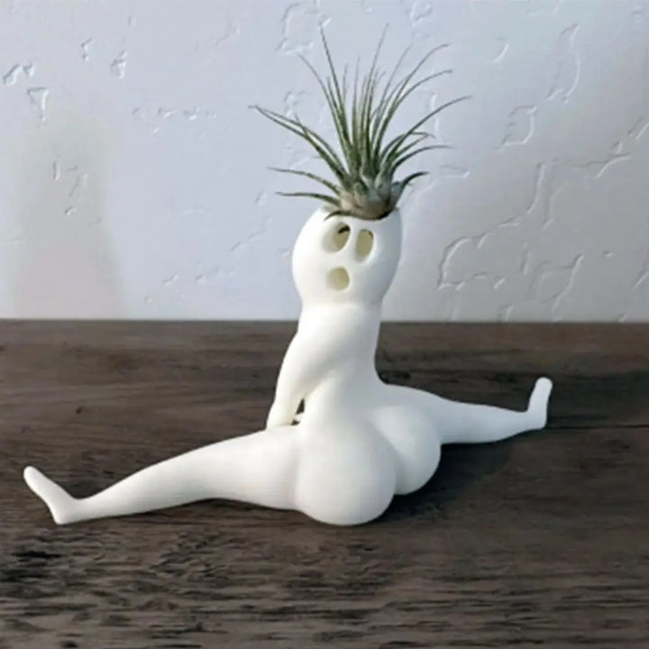 Adorable resin ghost air plant holder, perfect for spooky home decor, a unique and funny indoor plant display.